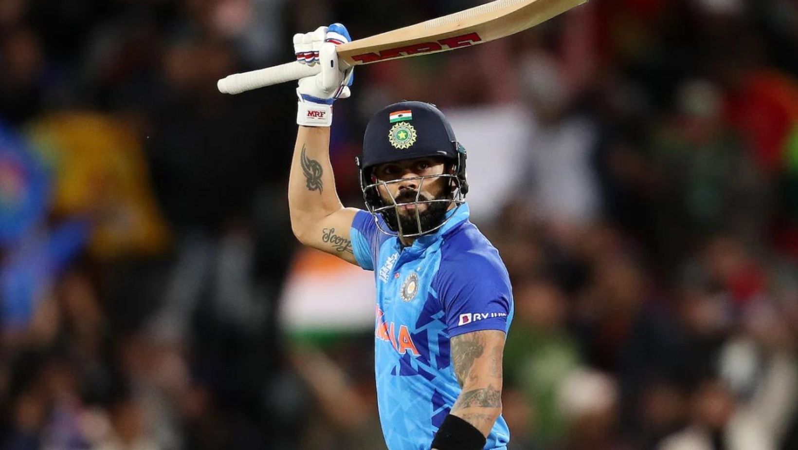 Virat Kohli celebrating his half-century against Bangladesh. 