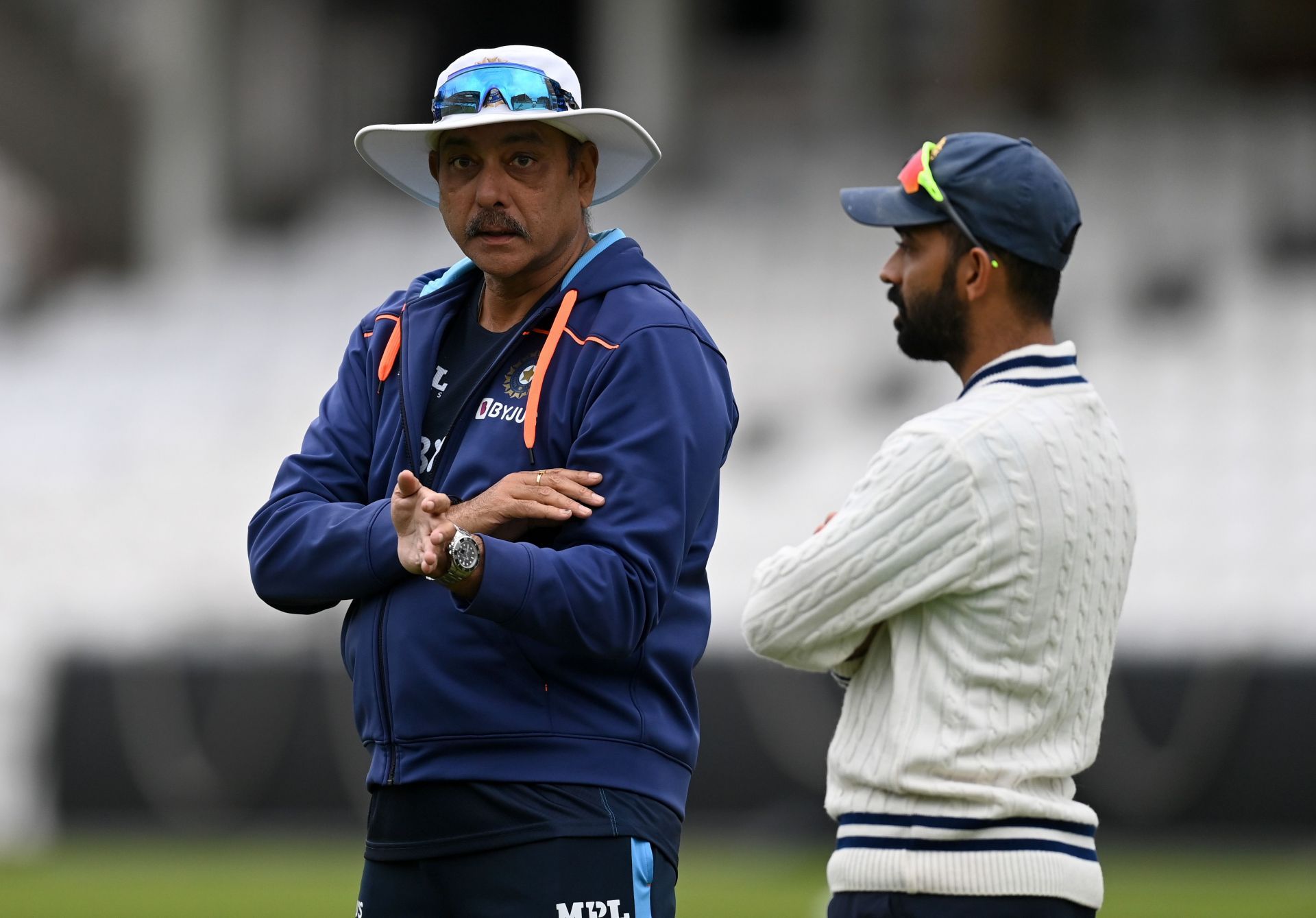 Ajinkya Rahane of India speaks with coach Ravi Shastri