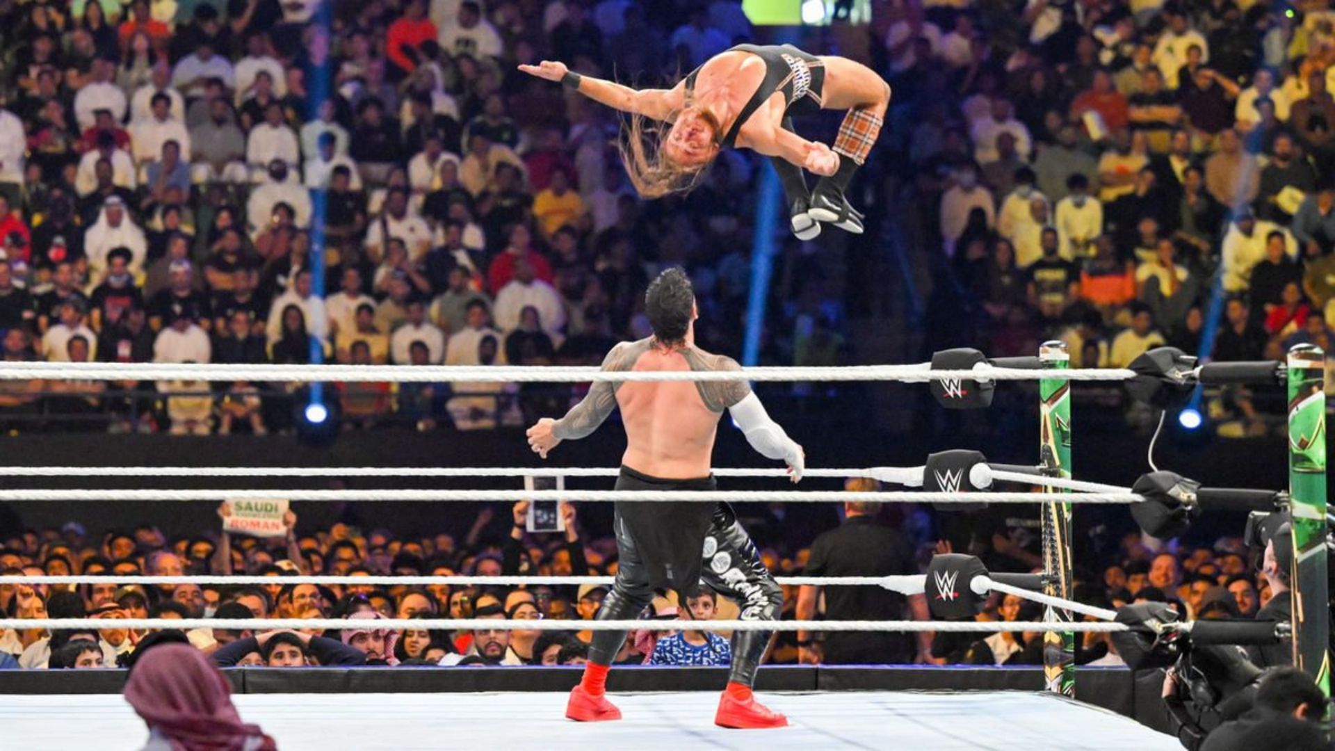 Butch flying during The Brawling Brutes' match against The Usos