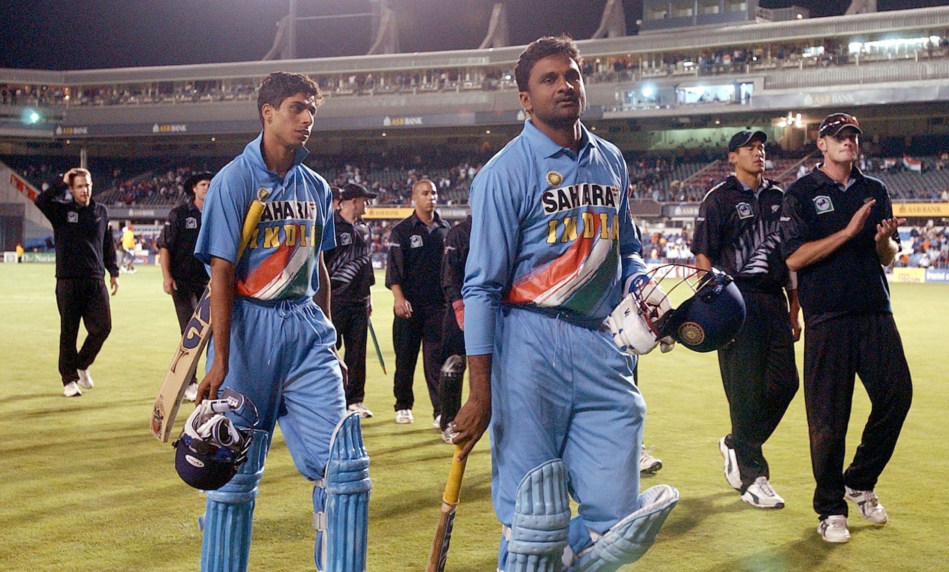 Ashish Nehra (L) and Javagal Srinath walk off the field after the Auckland one-dayer. Pic: Getty Images