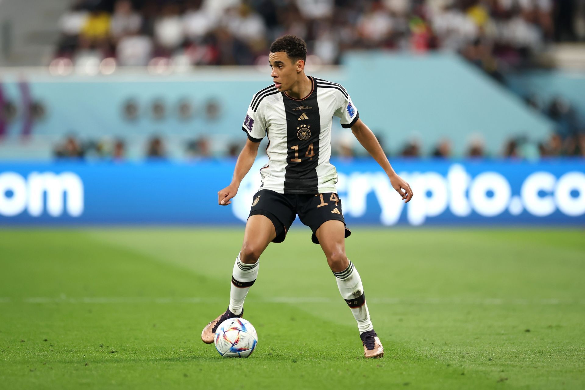 Jamal Musiala in action for Germany during their 2022 FIFA World Cup opener versus Japan in Qatar.