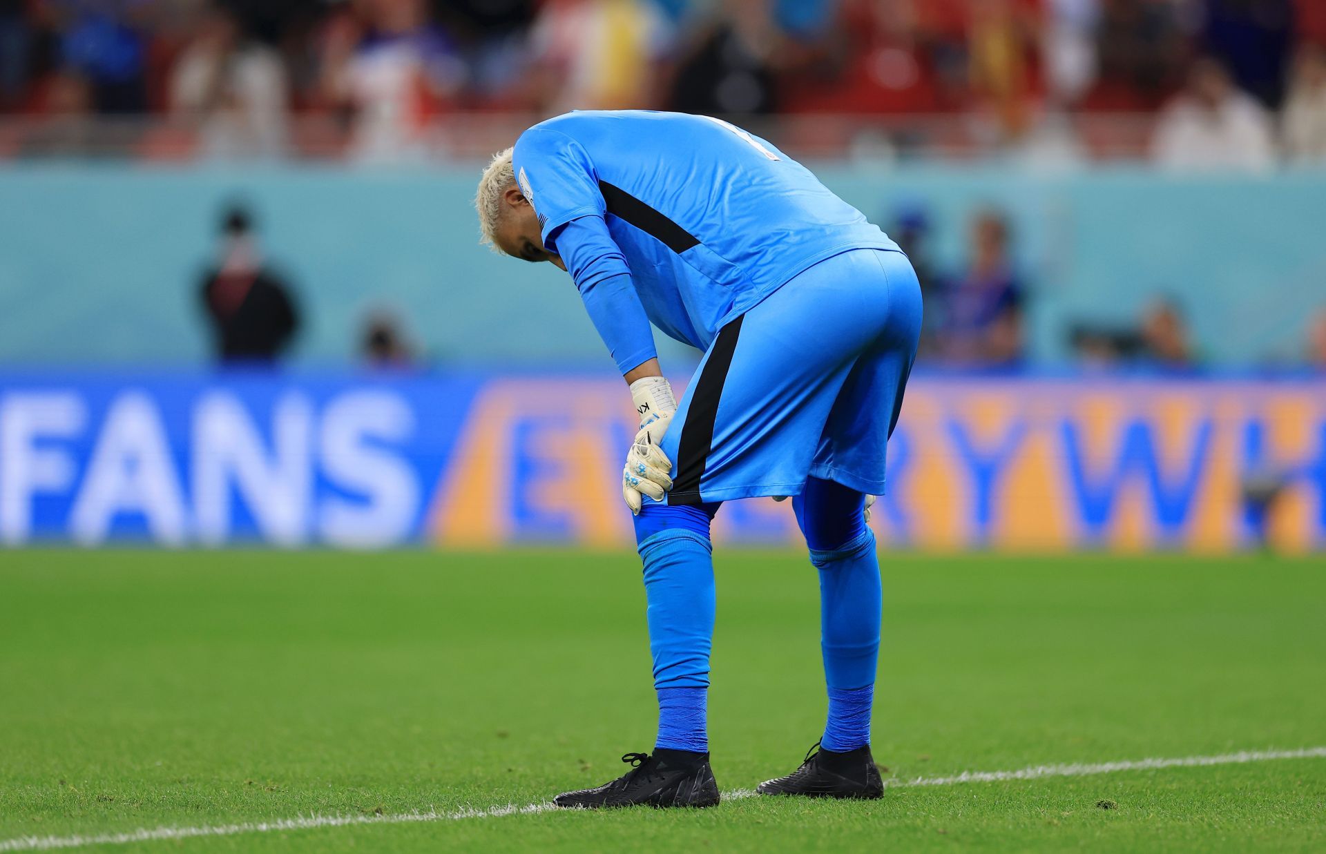 Keylor Navas cuts a dejected figure following Costa Rica's humiliating defeat.