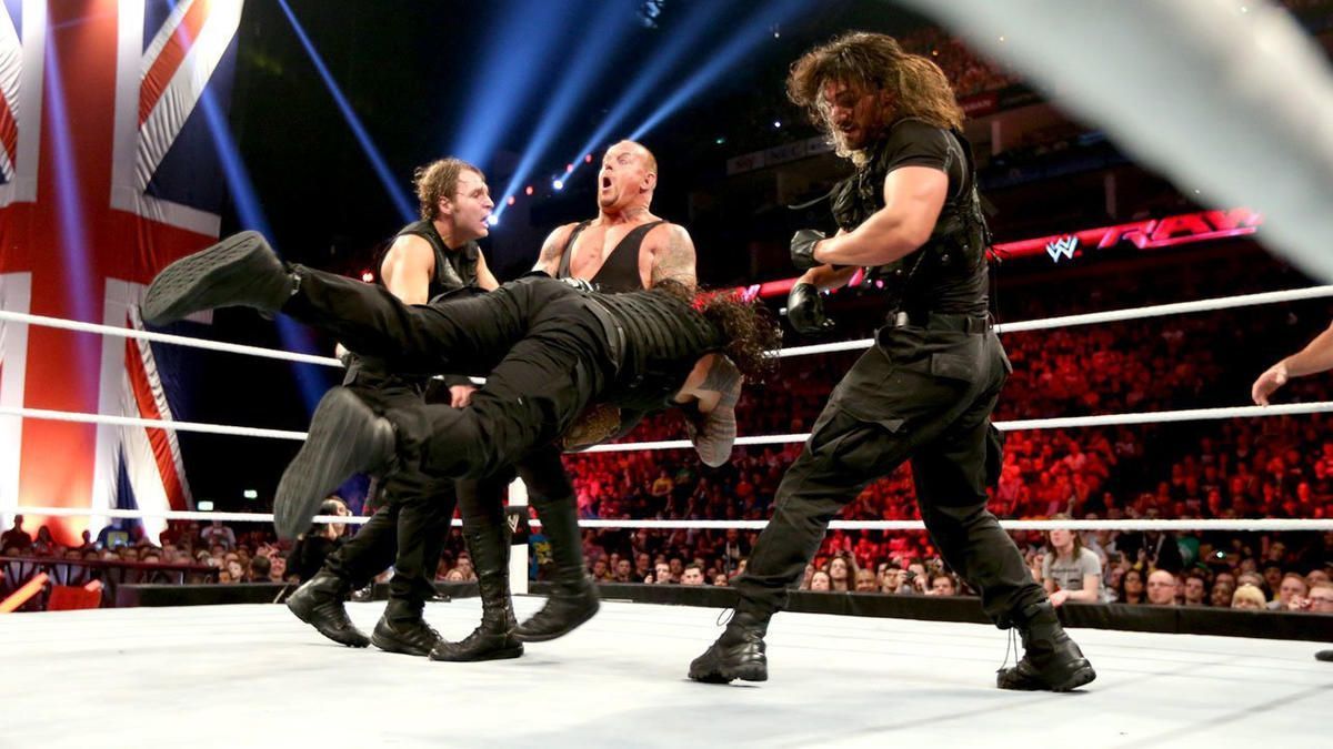 The Undertaker being attacked by The Shield