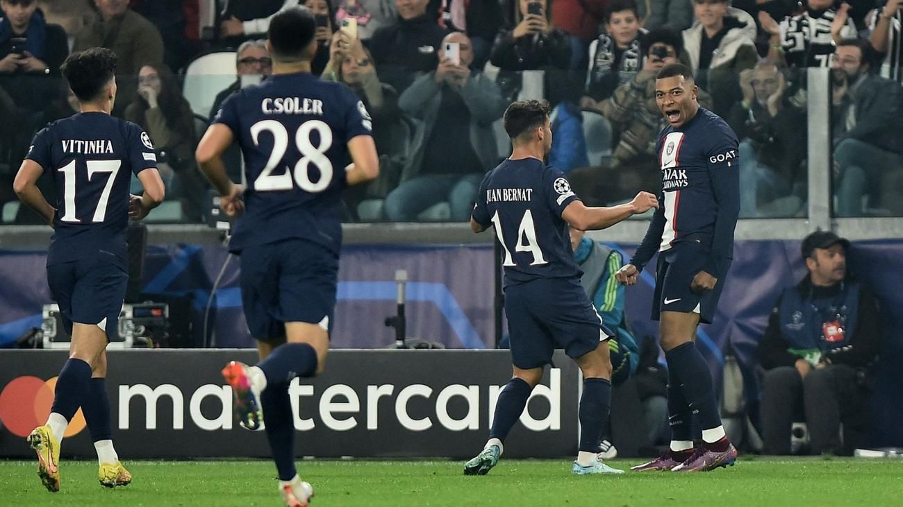 Kylian Mbappe celebrates his goal against Juventus with his teammates.