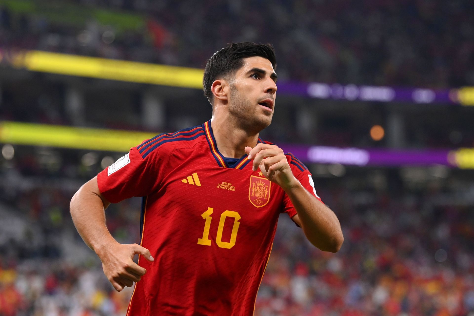 Marco Asensio celebrates after scoring the goal