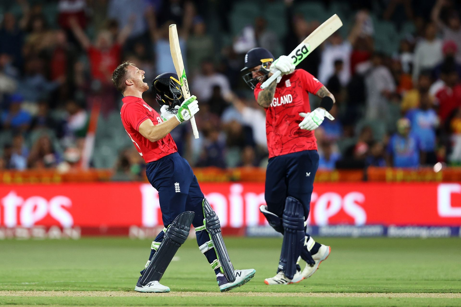 Jos Buttler (left) and Alex Hales celebrate England&rsquo;s victory over India in the semi-final. Pic: Getty Images