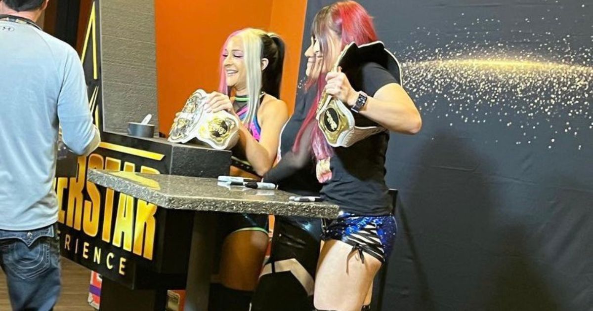 Dakota Kai, Bayley, and Iyo Sky, aka Damage Control.