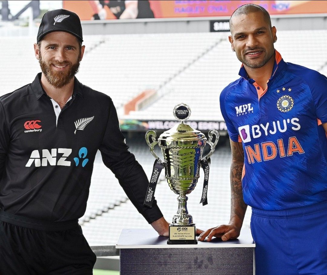 Kane Williamson (L) and Shikhar Dhawan (R) posing with the ODI trophy [Pic Credit: BCCI]