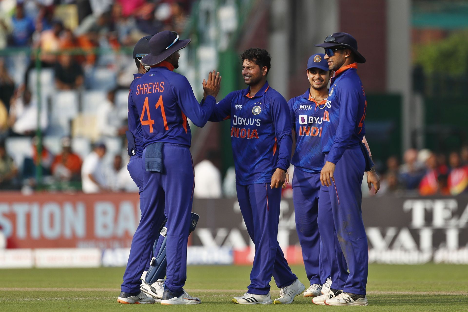 The left-arm spinner celebrates a wicket with his teammates. Pic: Getty Images