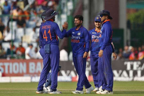 The left-arm spinner celebrates a wicket with his teammates. Pic: Getty Images