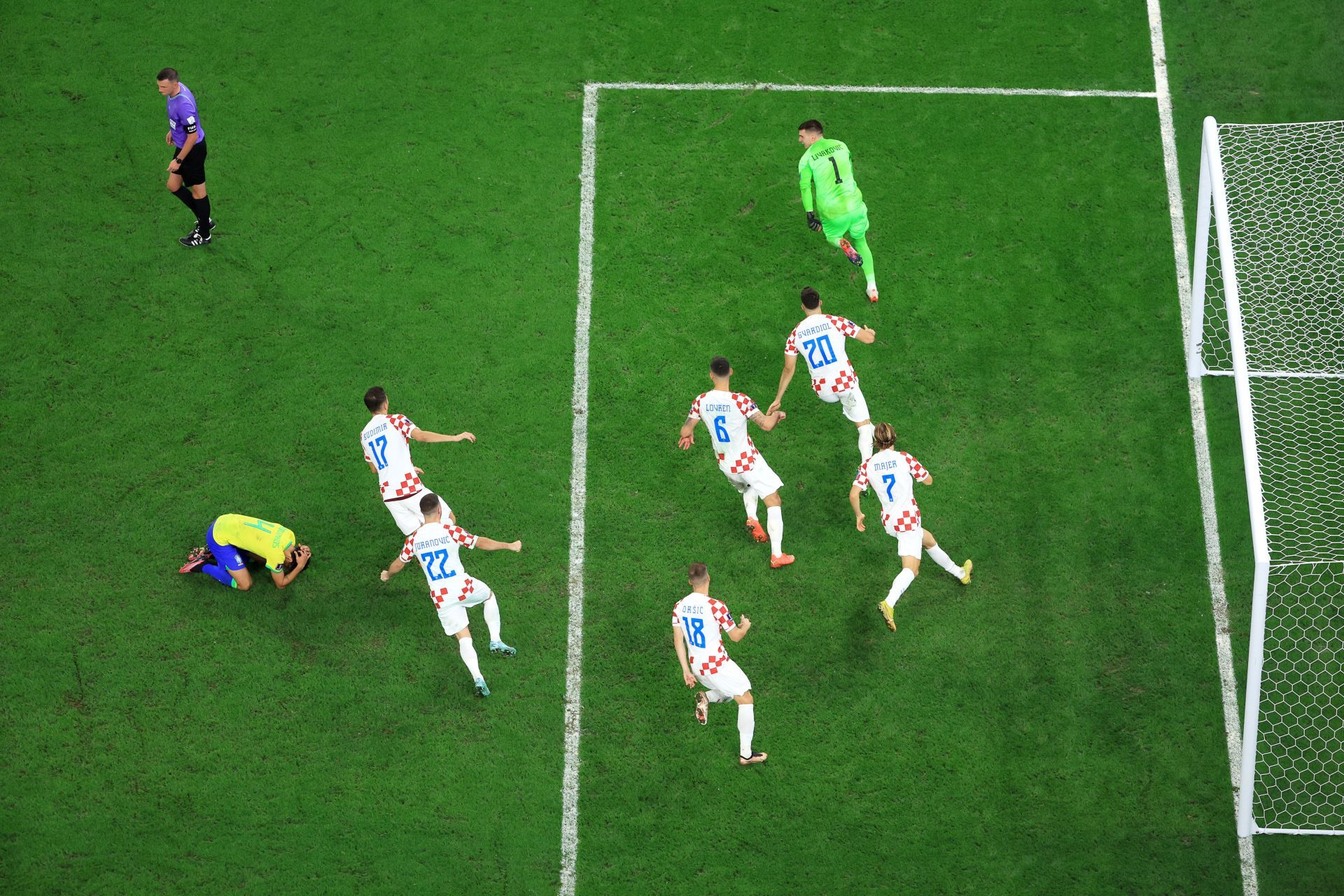 Croatian players celebrate after winning the shootout v Brazil in the Quarter Final of FIFA World Cup 2022