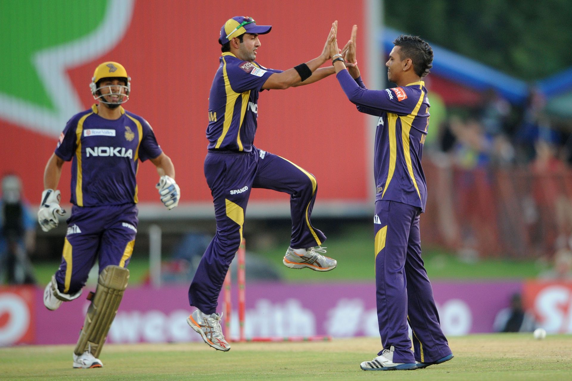 Gautam Gambhir celebrates a wicket with Sunil Narine. Pic: BCCI