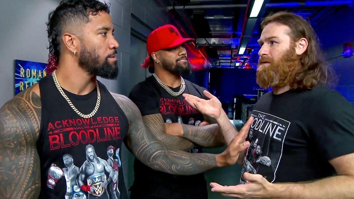 Sami Zayn and Jey Uso in an argument backstage on WWE SmackDown