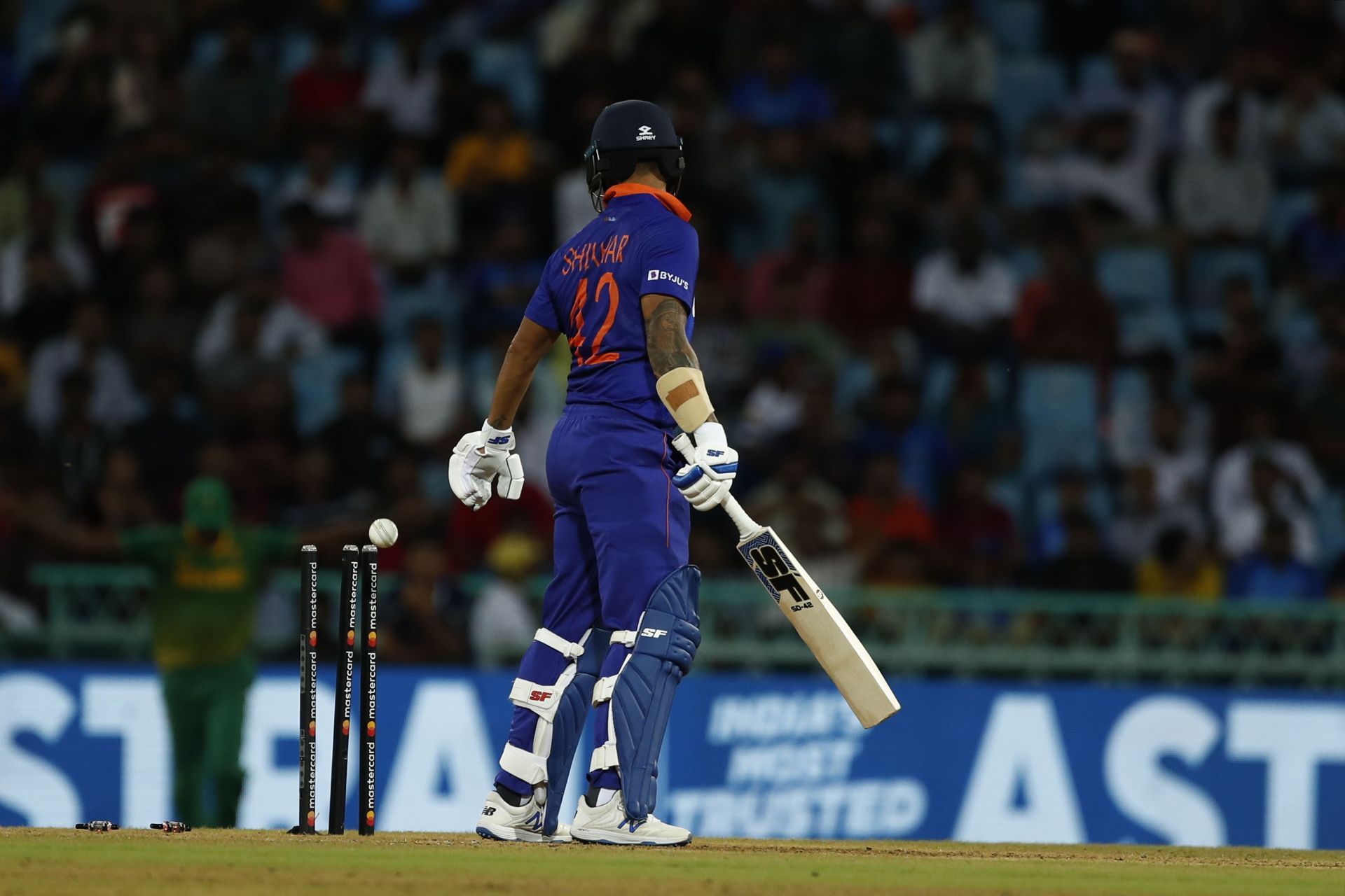 Shikhar Dhawan was bowled while playing the reverse sweep.