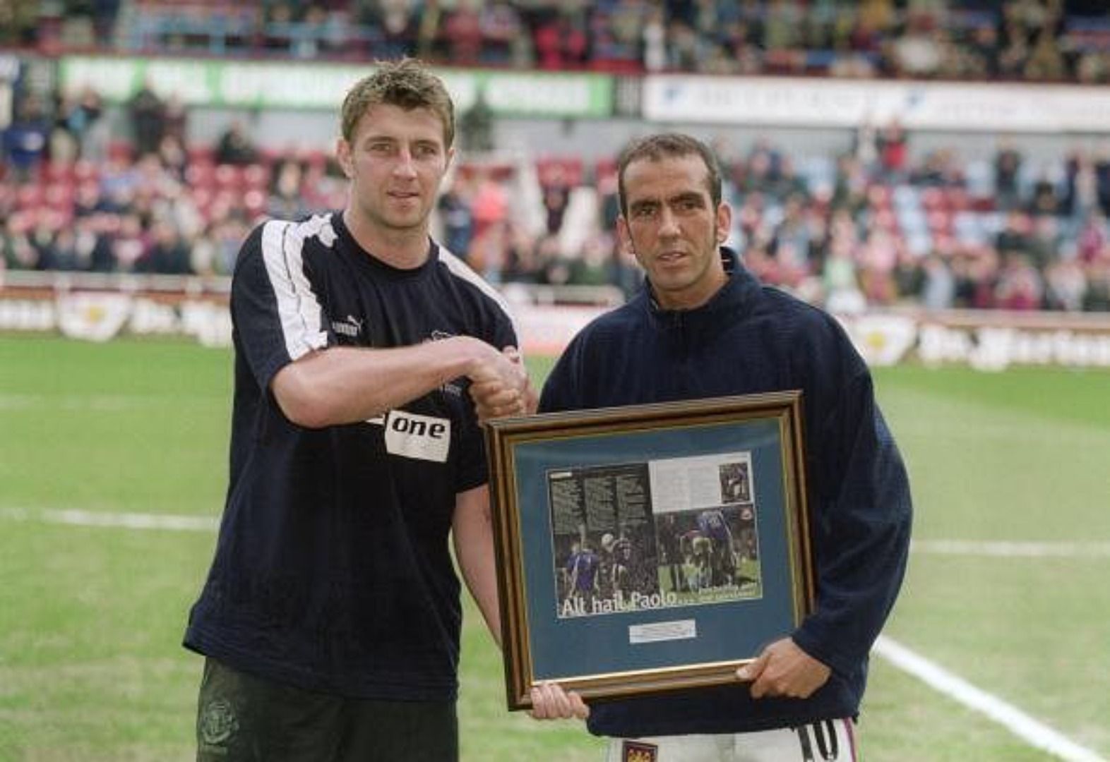 Paolo di Canio of West Ham receives an award from Everton&#039;s Paul Gerrard for his sportsmanship.