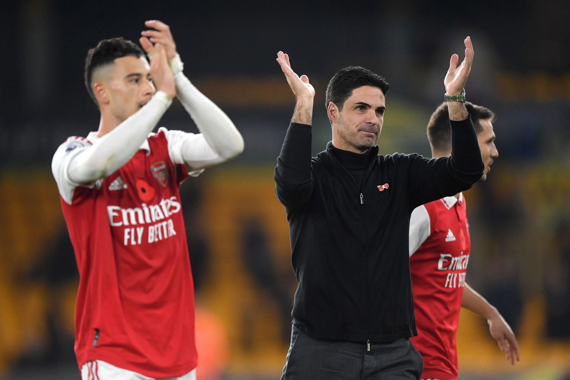 Arteta (right) was praised by the Liverpool assistant coach (not in pic).