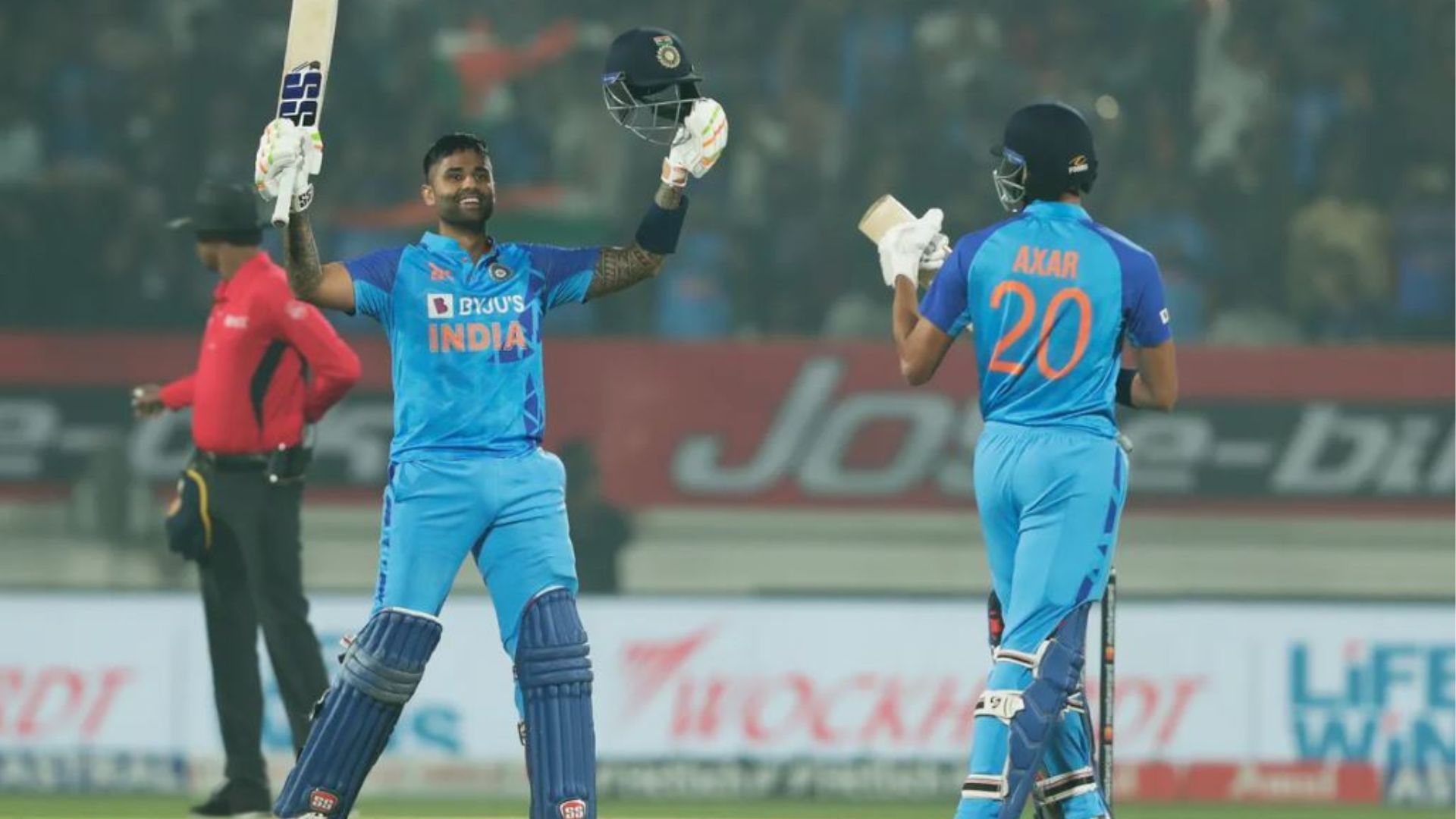 Suryakumar Yadav raises his bat after scoring his 3rd T20I century against Sri Lanka. 