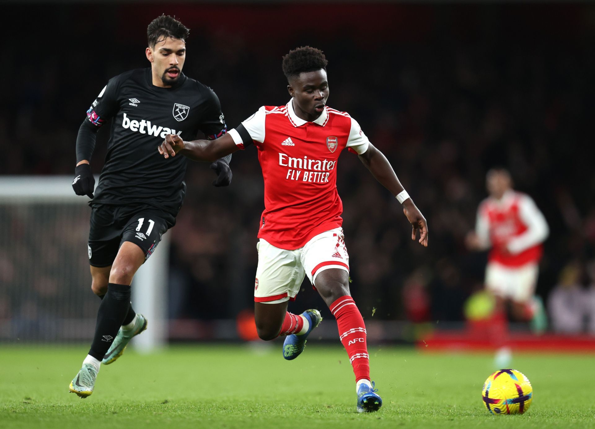 Bukayo Saka (right) is likely to stay at the Emirates till 2024.
