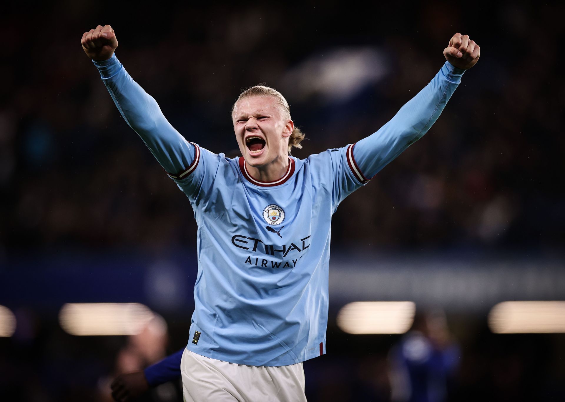 Erling Haaland celebrates after winning against Chelsea.