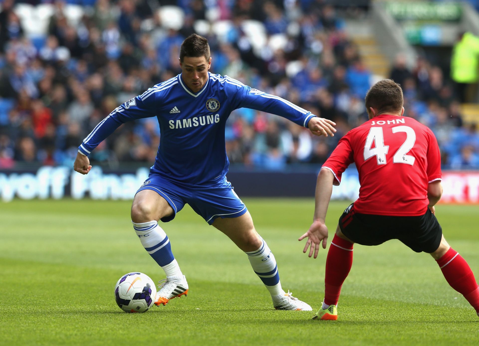 Torres playing against Cardiff City - Premier League