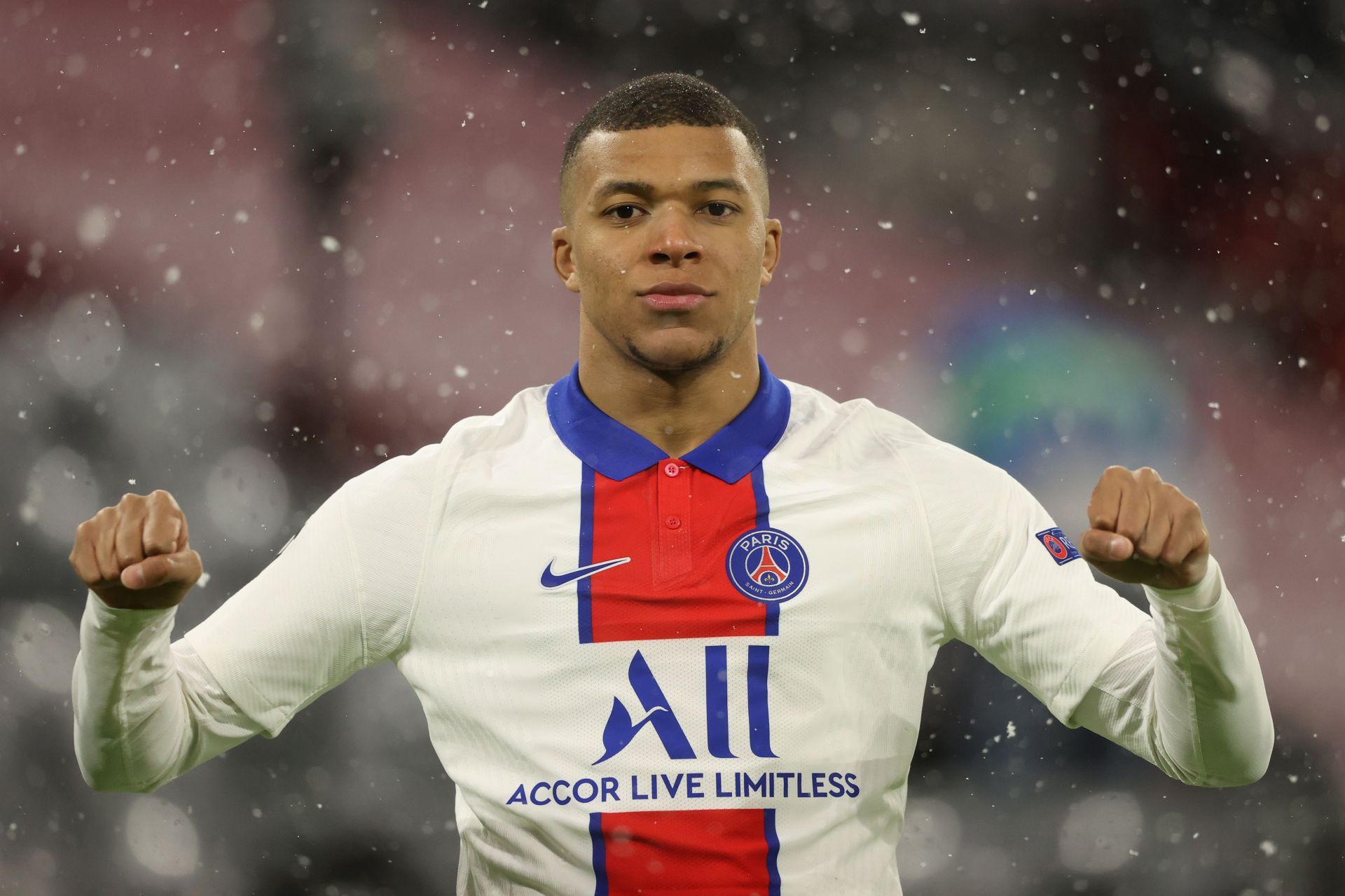 Kylian Mbappe celebrates after scoring after Bayern Munich.