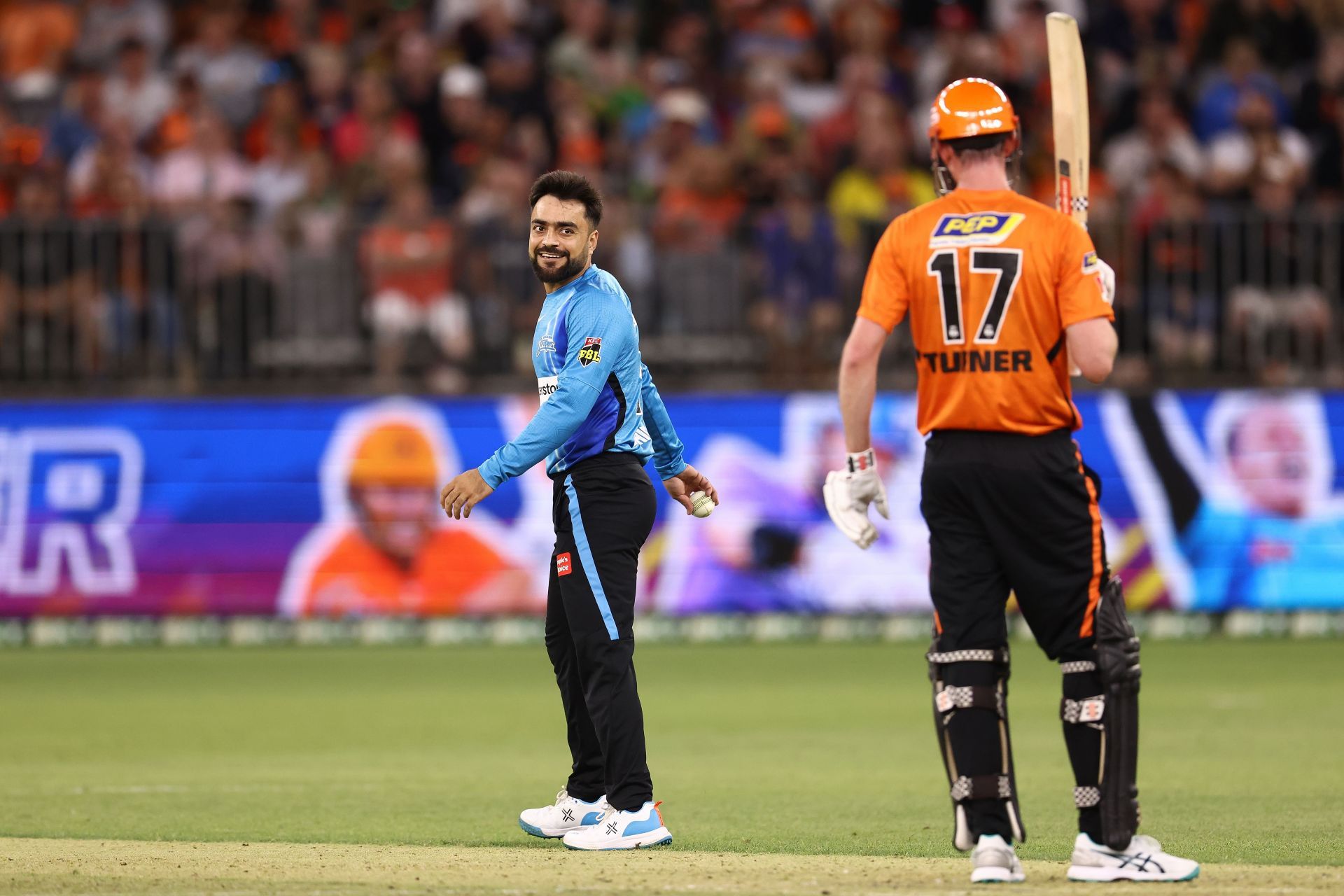 Rashid Khan of the Strikers exchanges words with Ashton Turner of the Scorchers. Pic: Getty Images