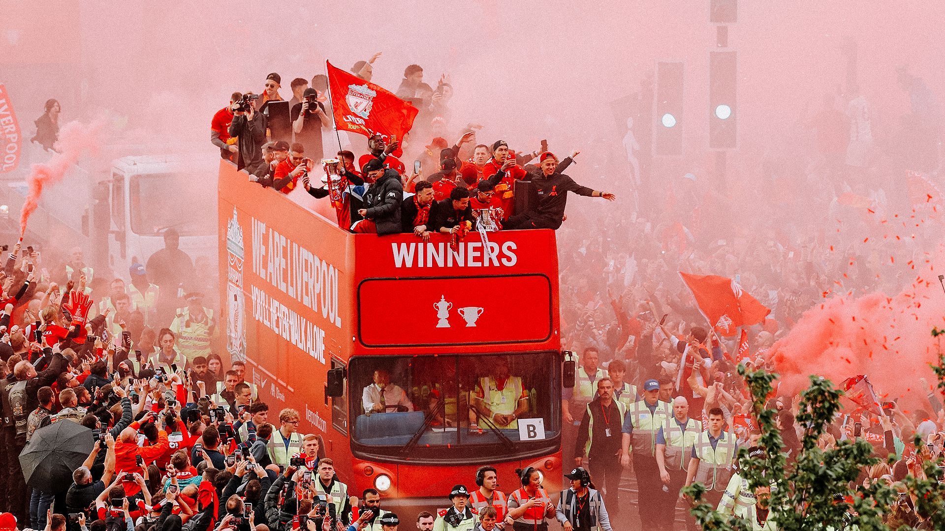 Bittersweet: Liverpool share last season&#039;s trophy haul with their fans- the day after losing the Champions League final.