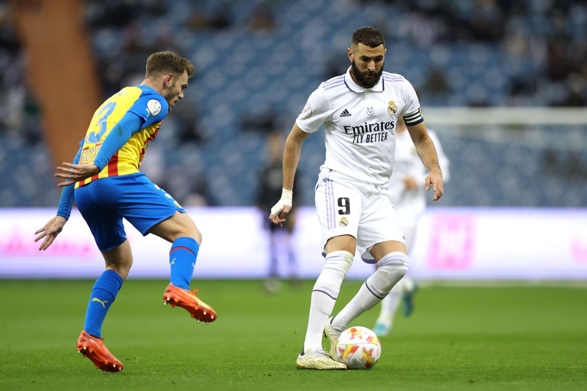 Karim Benzema (right) continues to be pivotal at the Santiago Bernabeu.