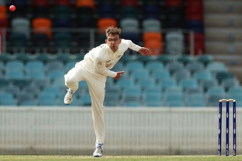 Todd Murphy of the Prime Ministers XI bowls during the tour match between the Prime Ministers XI and the West Indies at Manuka Oval on November 26, 2022, in Canberra, Australia. Pic: Getty Images