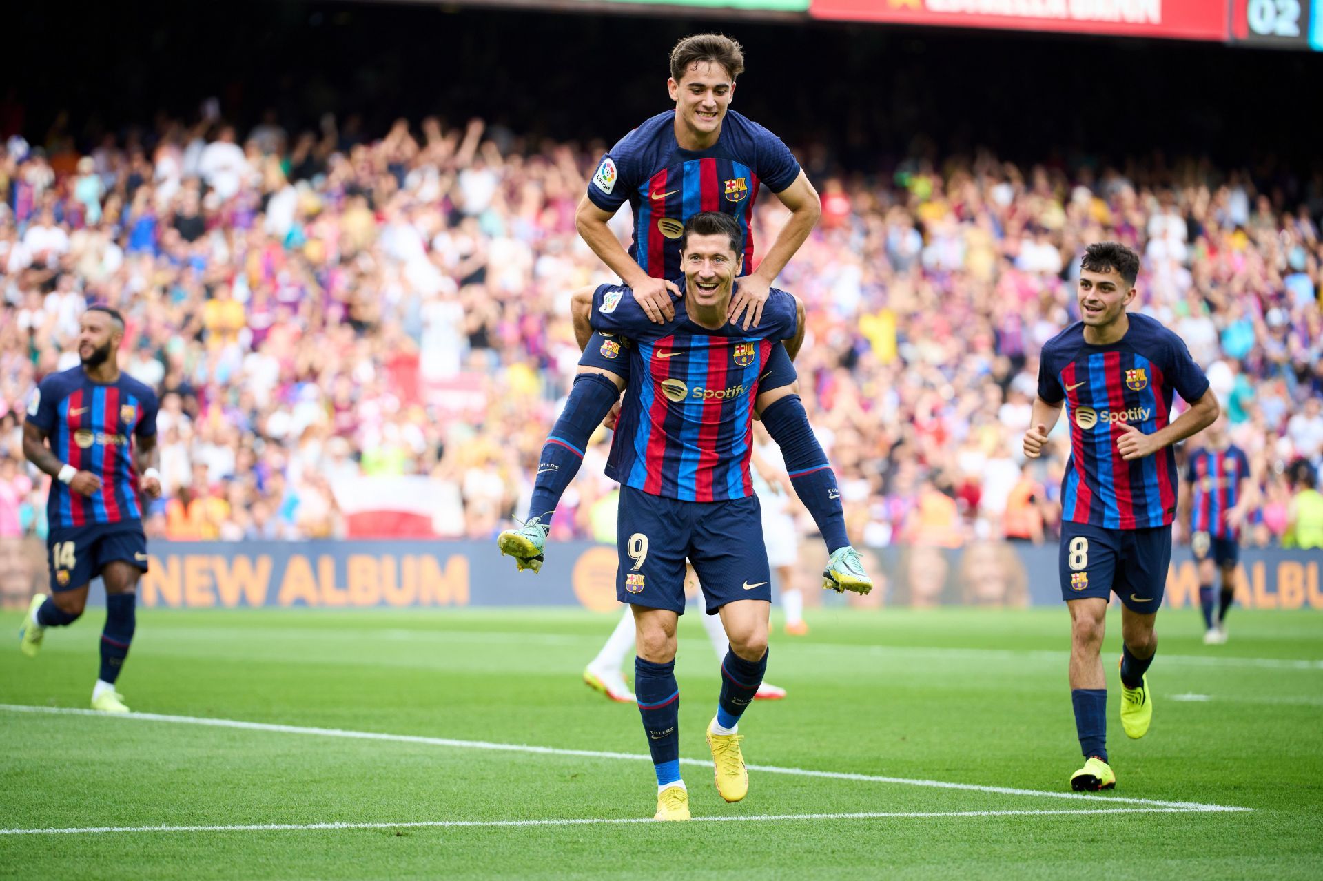 Robert Lewandowski and Gavi celebrating.