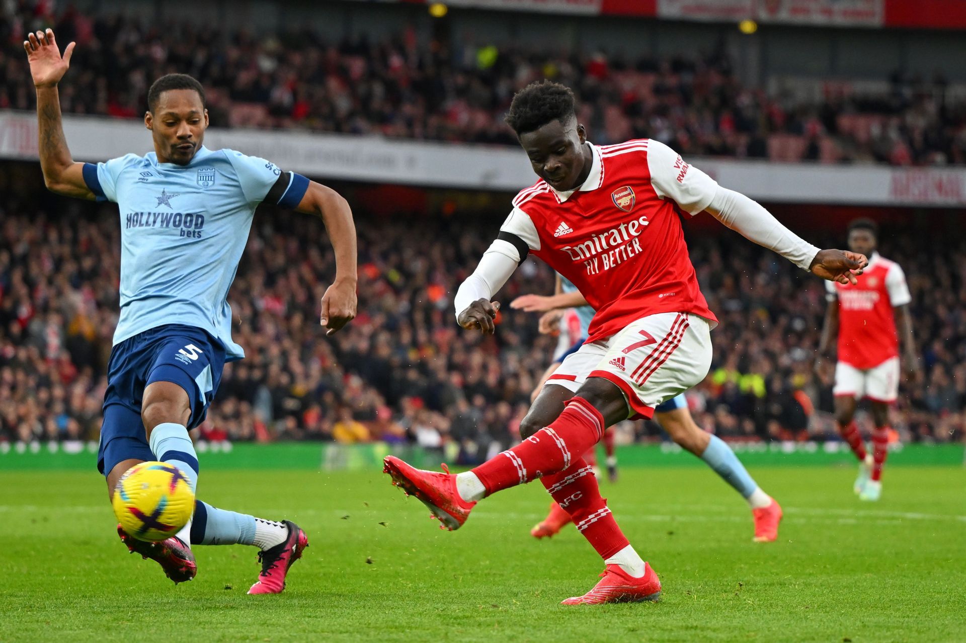 Bukayo Saka (right) has been on fire this season.