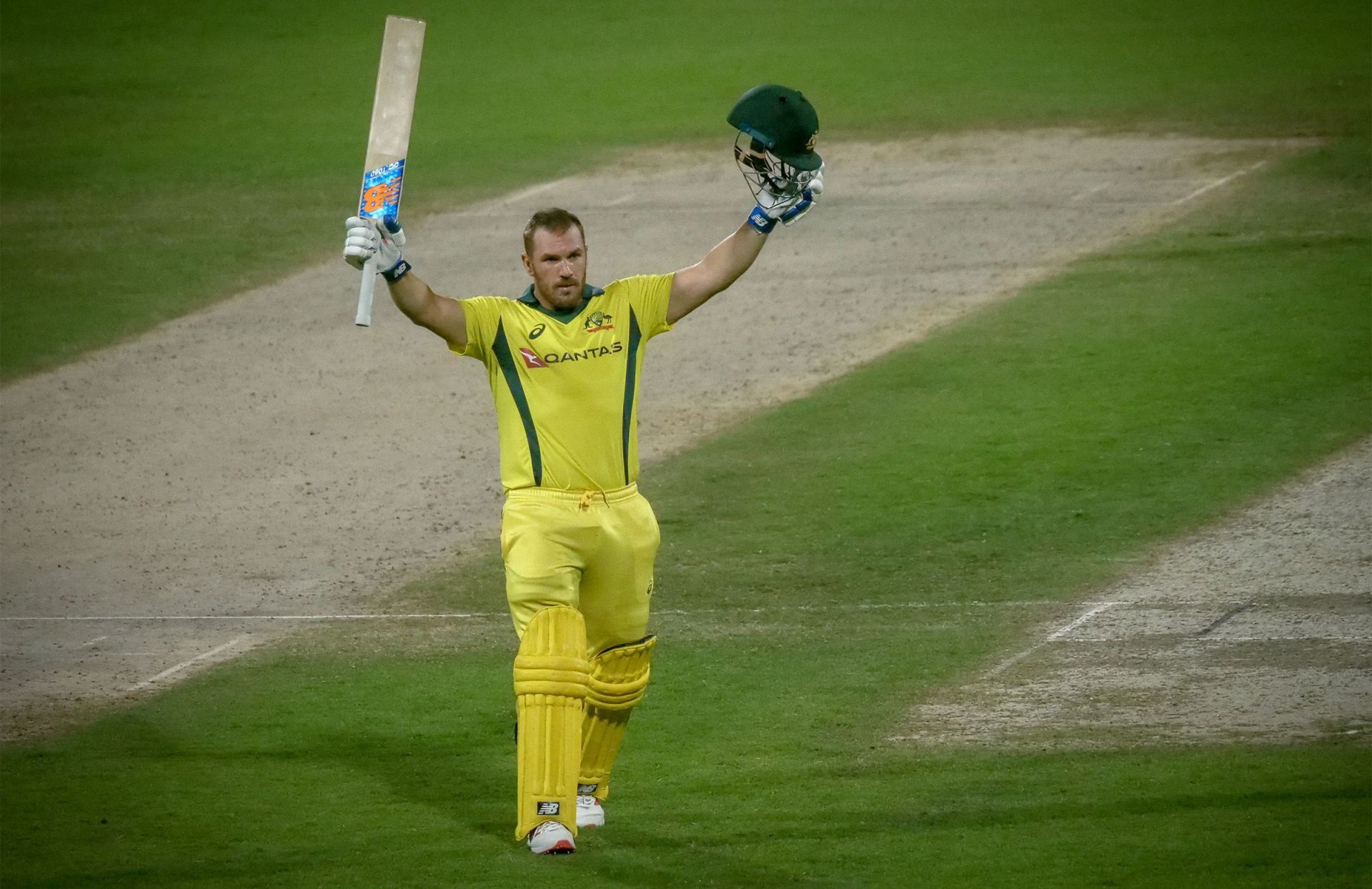 Aaron Finch celebrates after scoring a century against Pakistan