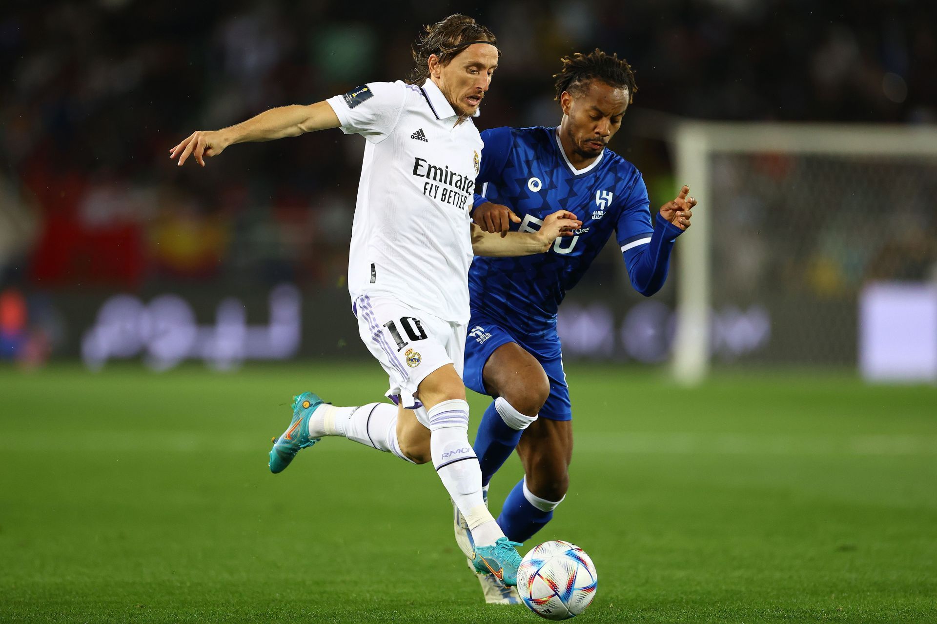 Luka Modric (left) is not looking to leave the Santiago Bernabeu.