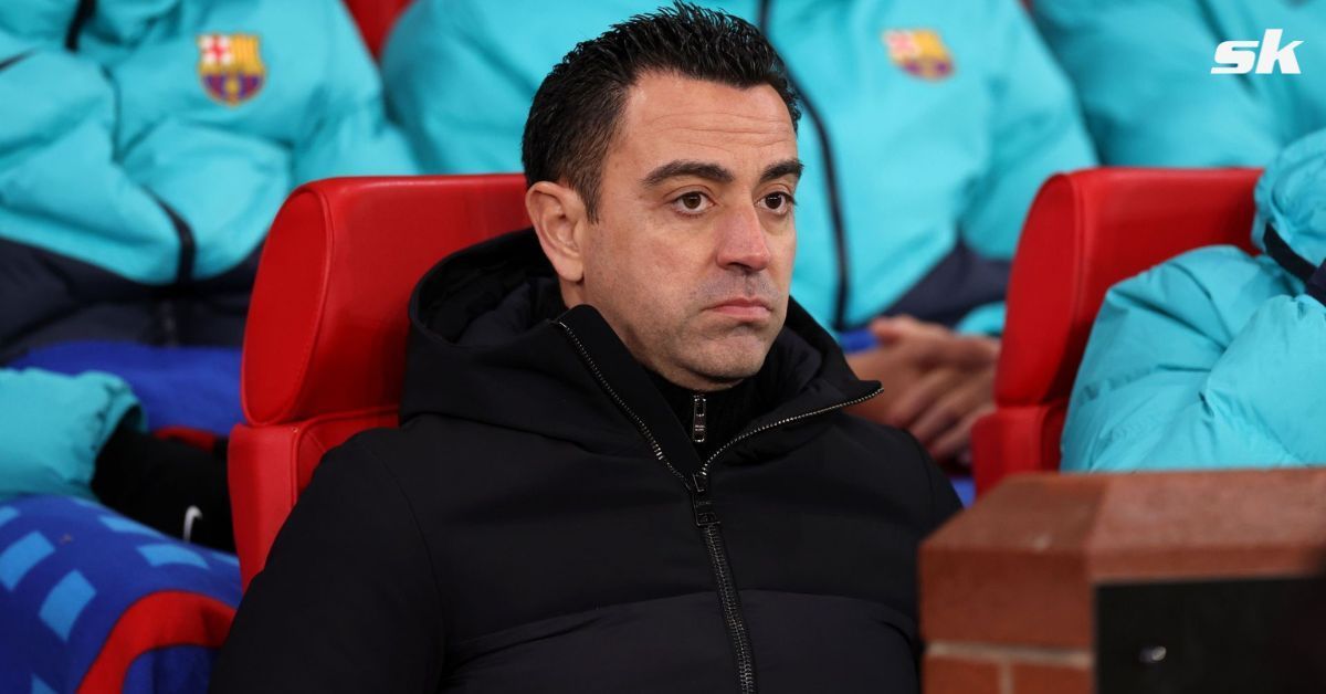 Barcelona manager Xavi Hernandez looks on.