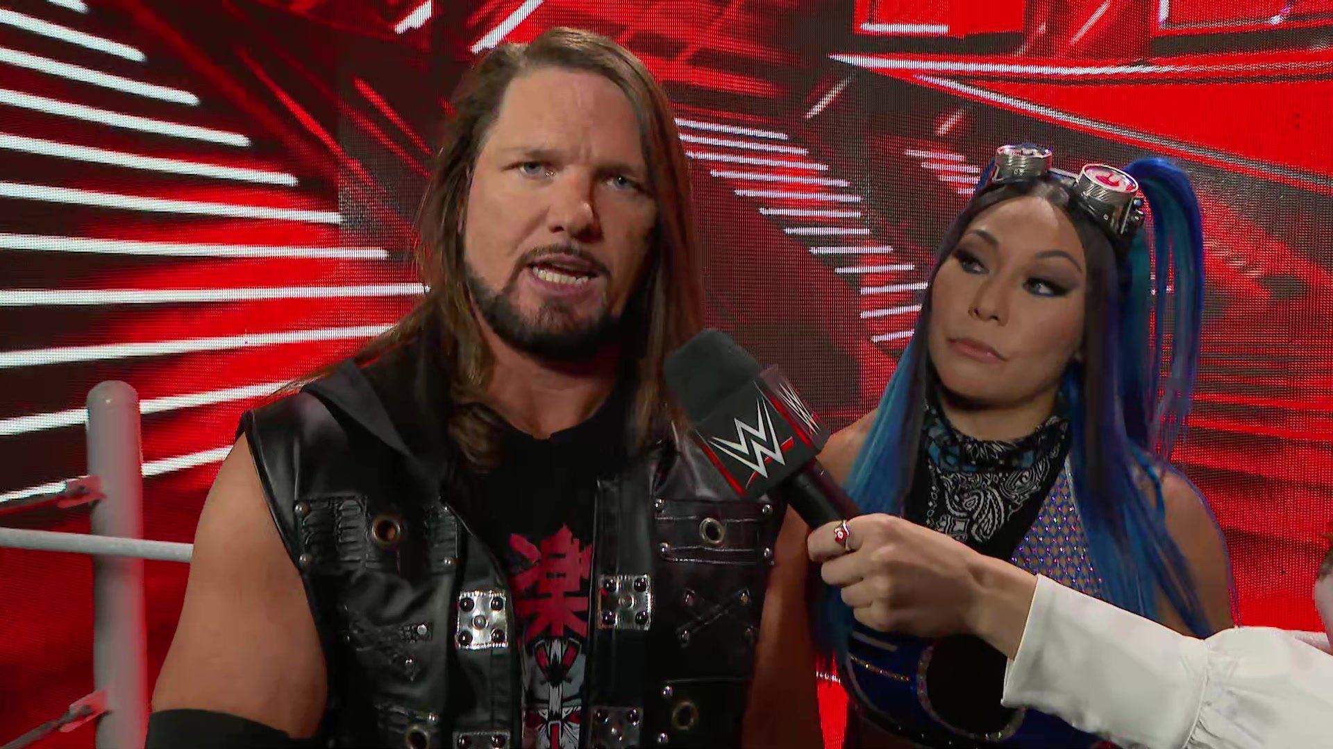 AJ Styles with Mia Yim