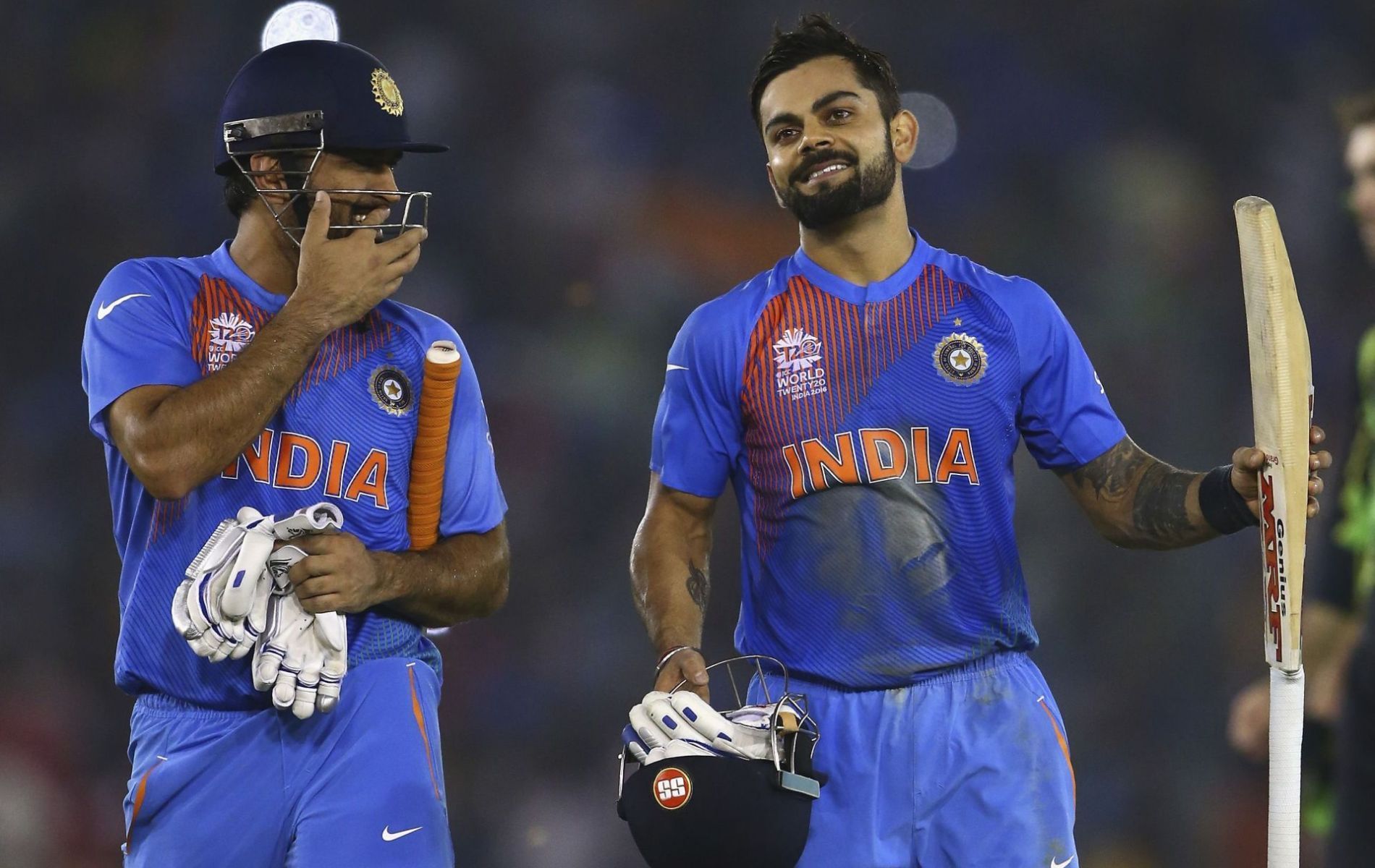 MS Dhoni (L) and Virat Kohli (R). (Pic: Getty)