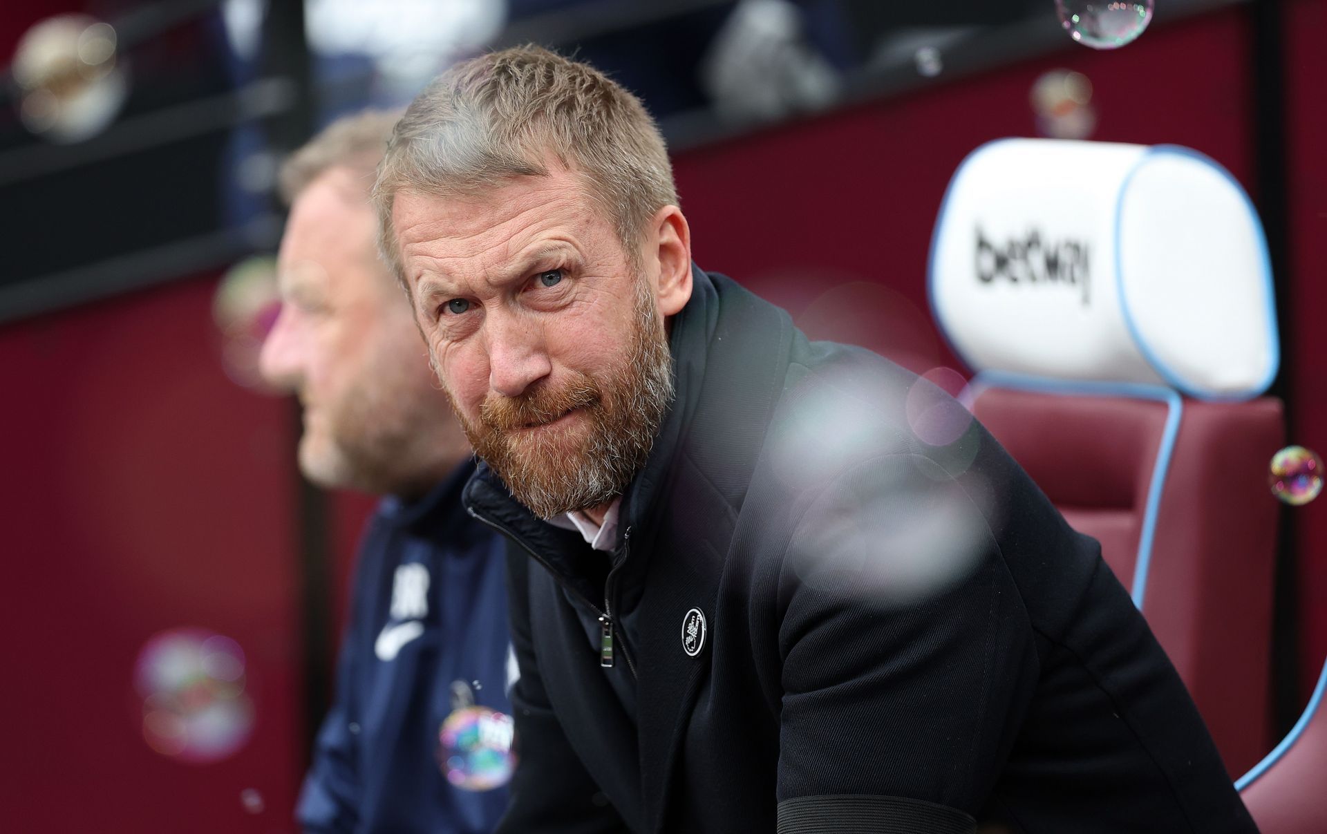 Graham Potter in bad light following loss.