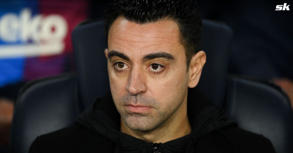 Barcelona manager Xavi Hernandez looks on.