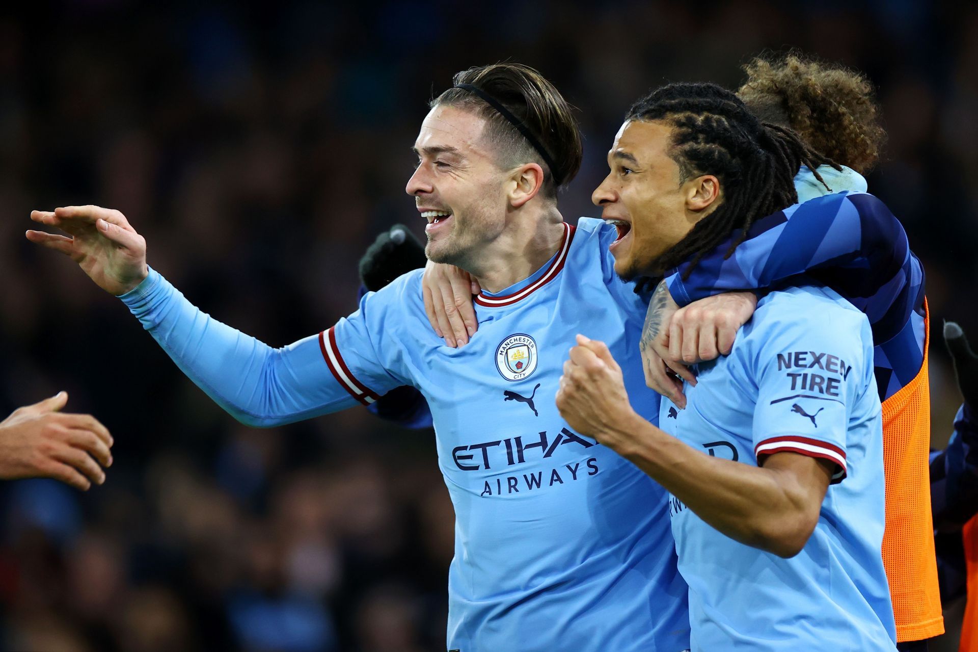 Jack Grealish and Nathan Ake celebrate the latter's goal against the Gunners in their FA Cup clash