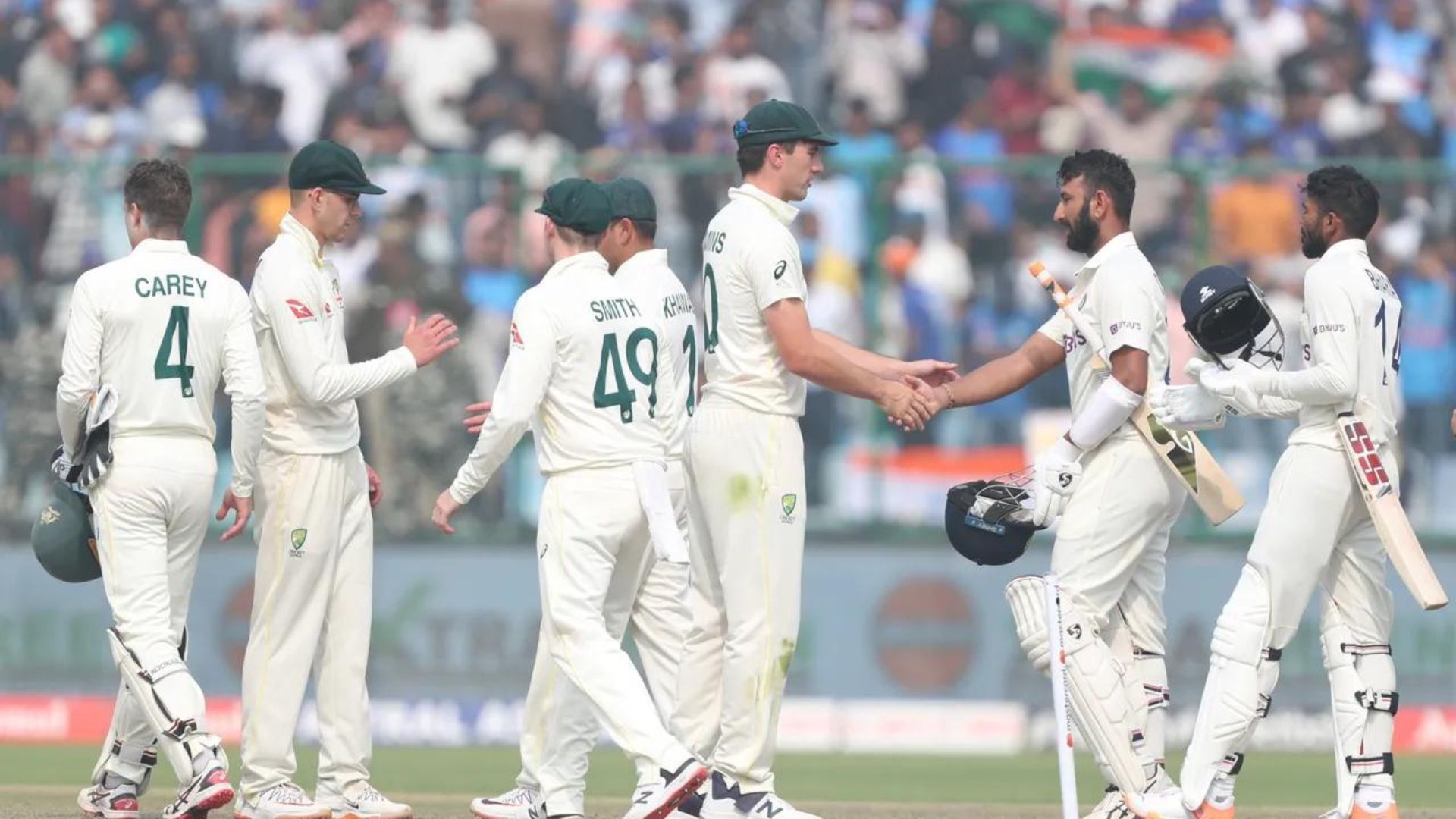 Players shaking hands after India