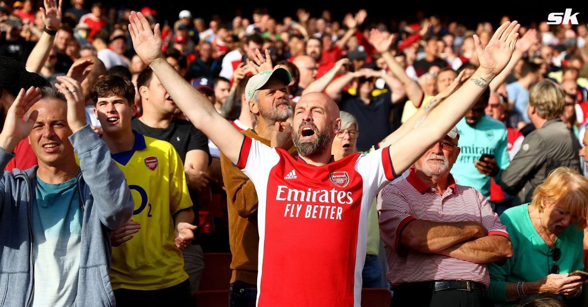 Arsenal fans react during a match.
