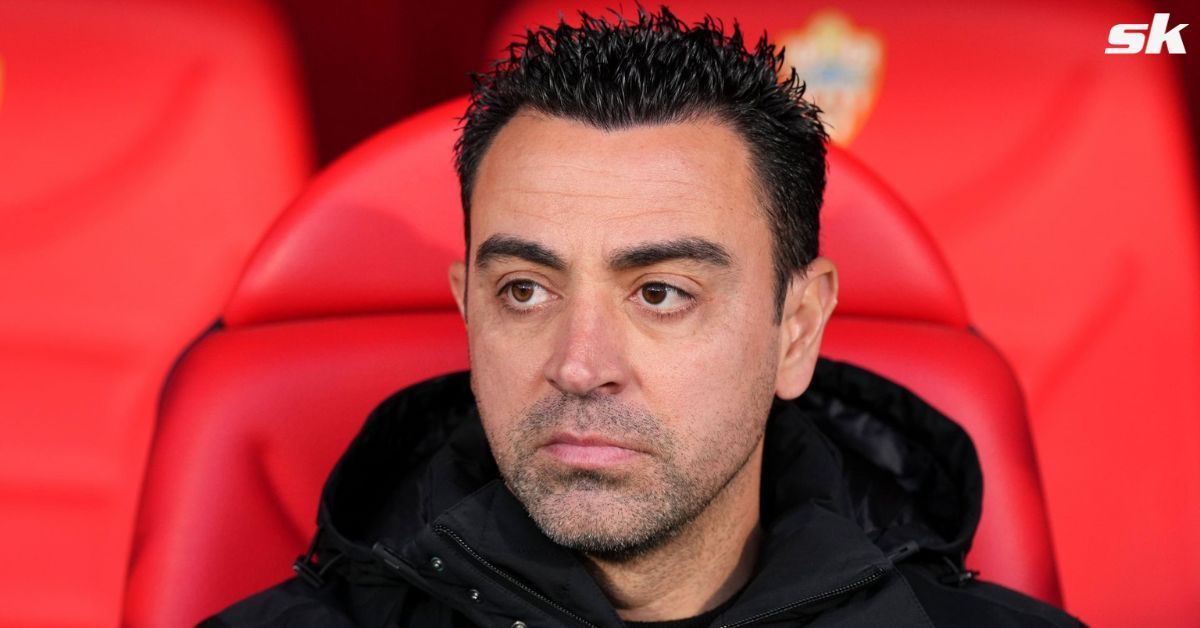 Barcelona manager Xavi Hernandez looks on.