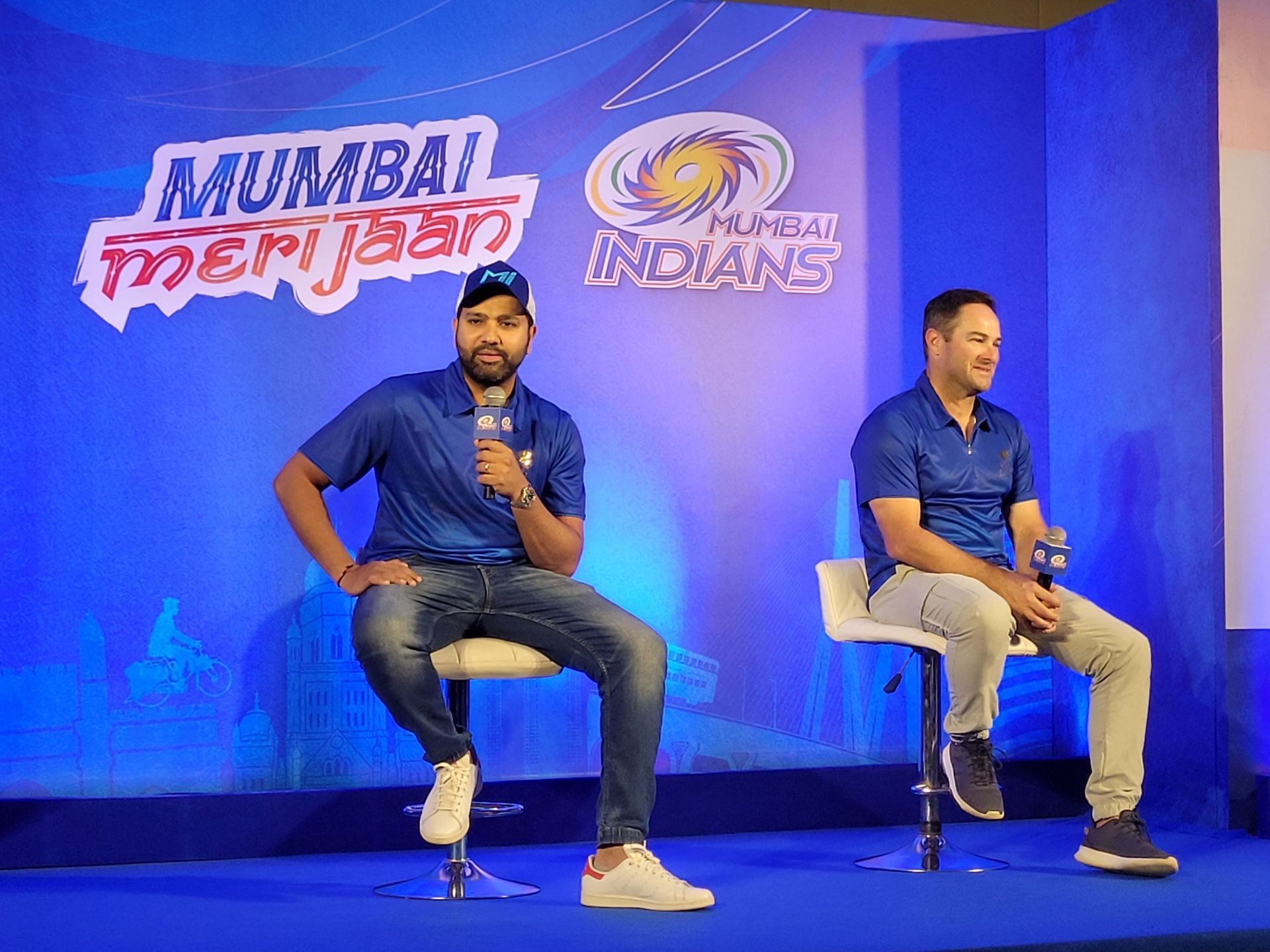 Rohit Sharma (L) addressing the press alongside coach Mark Boucher ahead of IPL 2023 (P.C.:Mumbai Indians)
