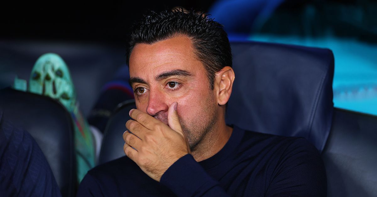 Barcelona manager Xavi Hernandez looks on.