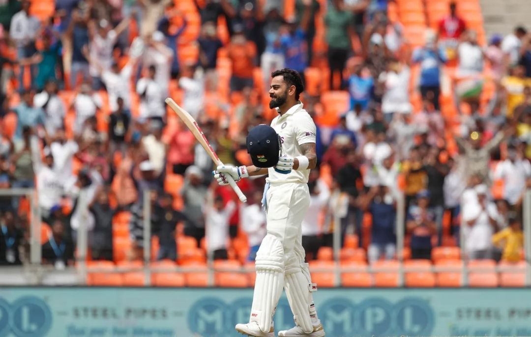 Virat Kohli raises his bat following his marvelous ton vs Australia [P.C: BCCI]