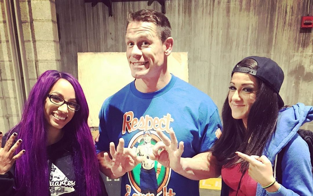 Sasha Banks, John Cena, and Bayley