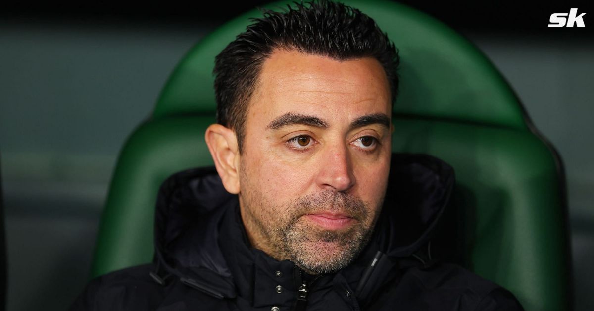 Barcelona manager Xavi Hernandez looks on.