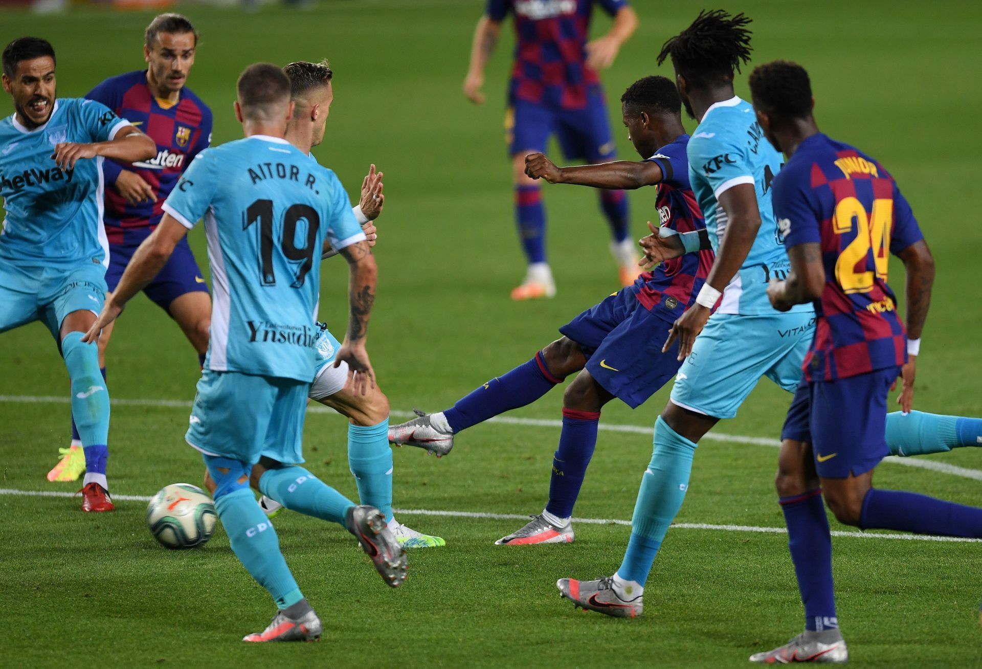 Fati strikes the ball in a game against Leganes