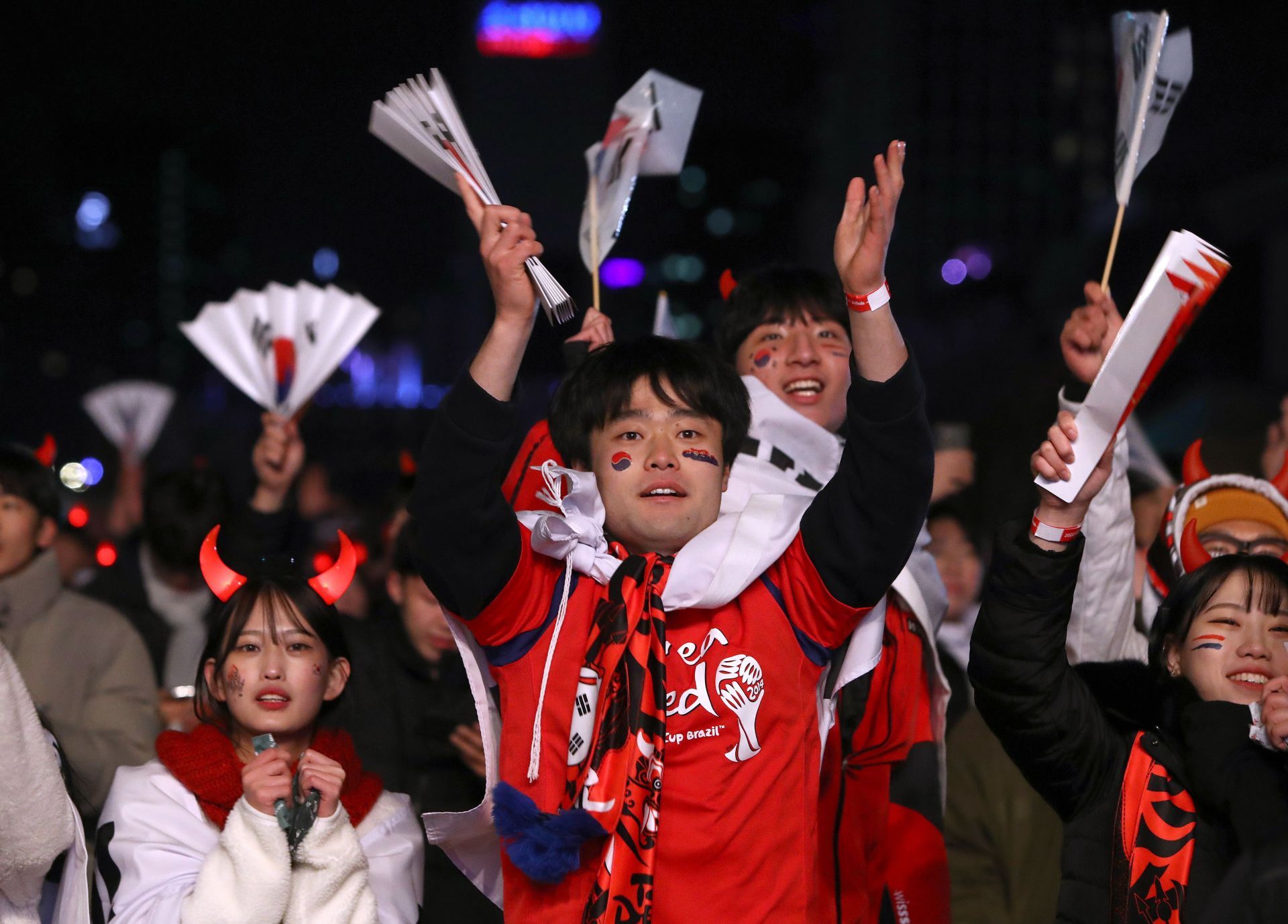 People Watch FIFA World Cup Round Of 16 Match Between Brazil And South Korea