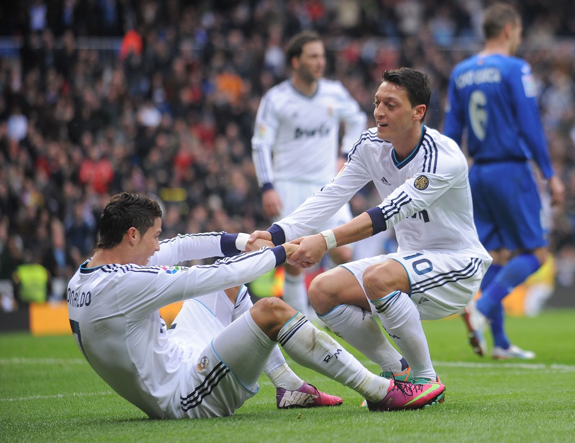 Cristiano Ronaldo and Mesut Ozil